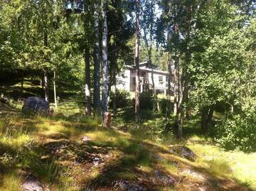 Фото номера Коттедж с 3 спальнями и сауной Дома для отпуска Äijälän Rusti Paratiisisaari г. Rymättylä 59