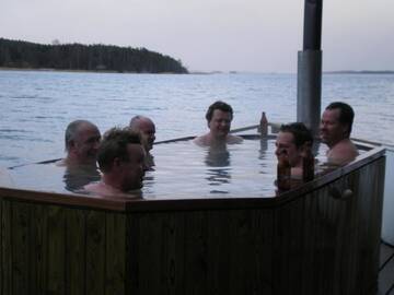 Фото номера Коттедж с 3 спальнями и сауной Дома для отпуска Äijälän Rusti Paratiisisaari г. Rymättylä 86